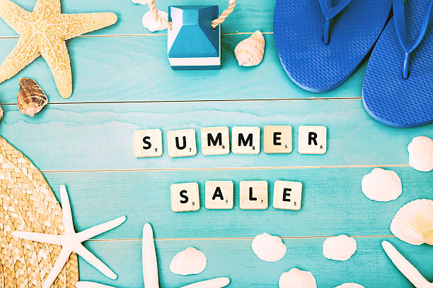 istock Wood Blocks on a Table for Summer Sale Concept 487921590