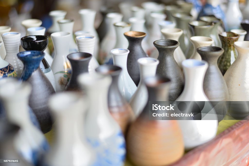 Sake carafes Line-up of traditional japanese sake carafes. Alcohol - Drink Stock Photo