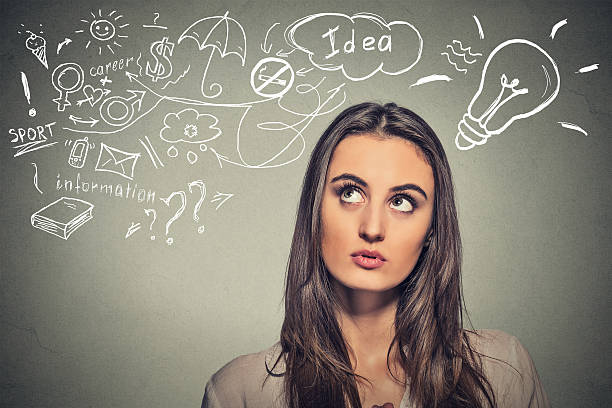 istock beautiful woman thinking looking up 487922052