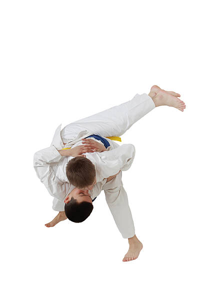 istock High throw judo are training boys in white kimono 487924043
