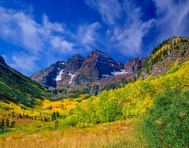 Maroon Bells With Autumn Aspen Trees fill the Rocky Mountains with fall color near Aspen Colorado