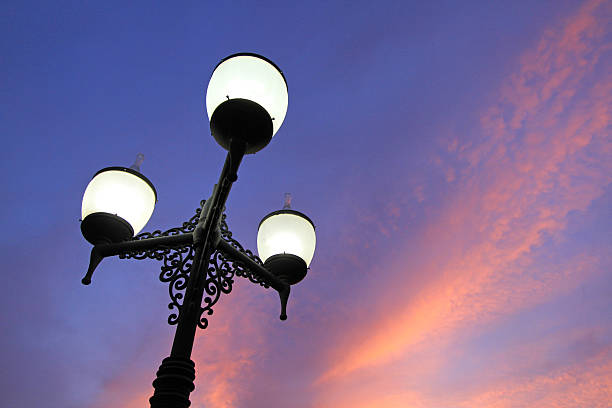 istock Antique lamps on twilight sky background 487936834