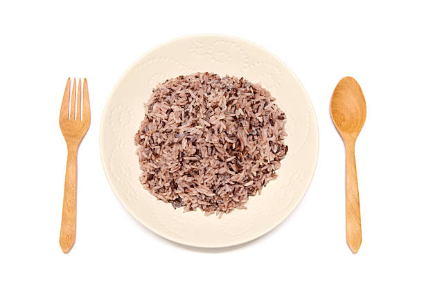 istock Rice mix purple rice berry rice in white plate 487939254