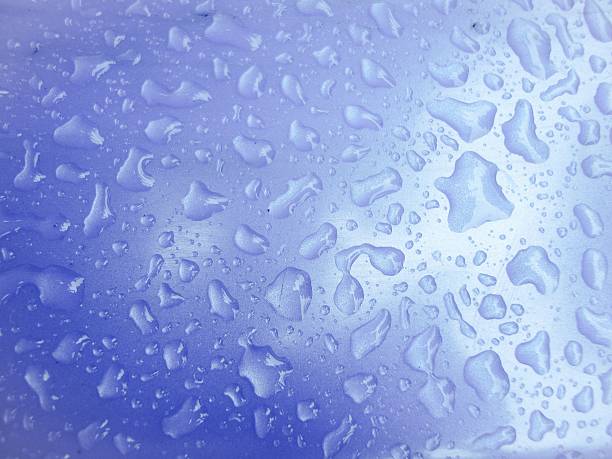 water rain drops with light blue background stock photo