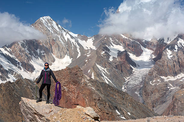 istock Female Climber Holding Ice Axe and Alpine Rope 487941400