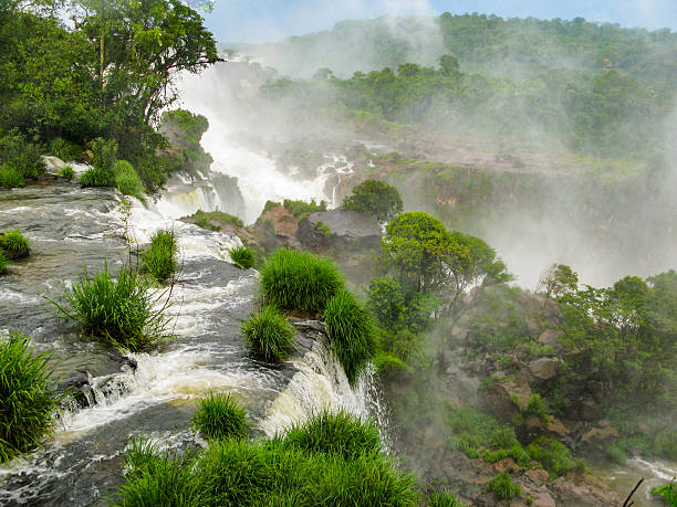 istock Iguassu waterfall in south america tropical jungle 487946322