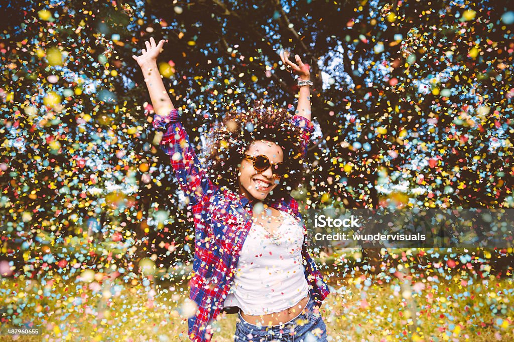Hipster enjoying confetti Celebration Stock Photo