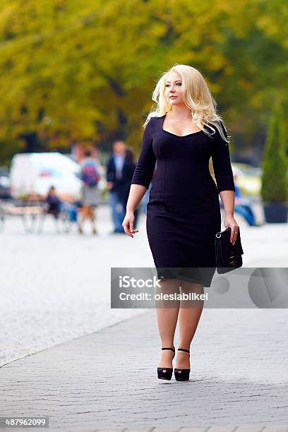 Attractive Overweight Woman Walking The City Street Stock Photo - Download Image Now