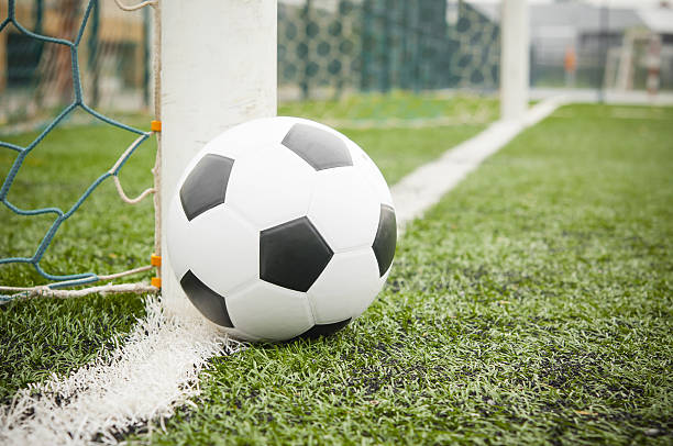 istock Soccer ball on the field 487963385