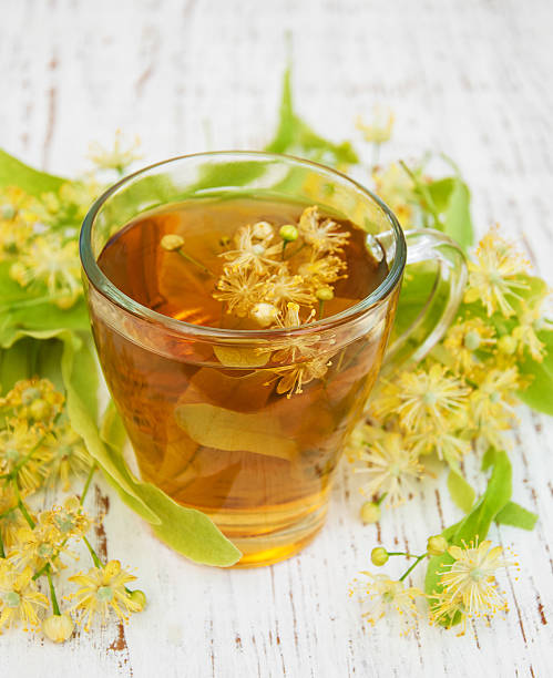 istock Cup of herbal tea with linden flowers 487966804