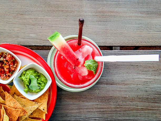Nachos with guacamole, salsa and cheese creame