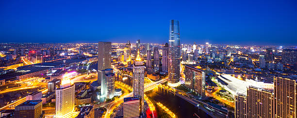 istock Panoramic high angle view of illuminated cityscape and skyline i 487971498