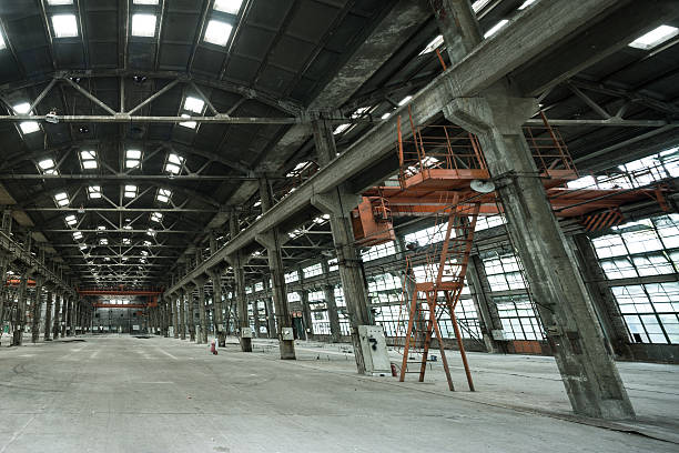 istock Empty floor in abandoned factory 487971758