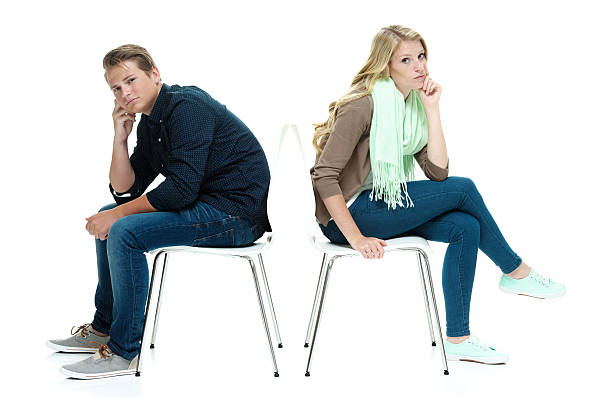 istock Couple sitting on chair 487975560