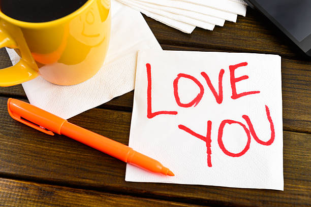 istock Love you -  handwriting on a napkin 487976960
