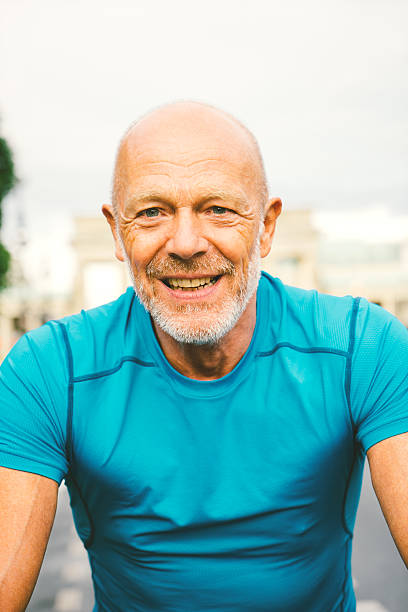 istock Senior Cyclist In A City Street 487977704