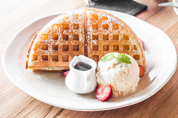 istock Strawberries waffles with vanilla ice cream 487980248