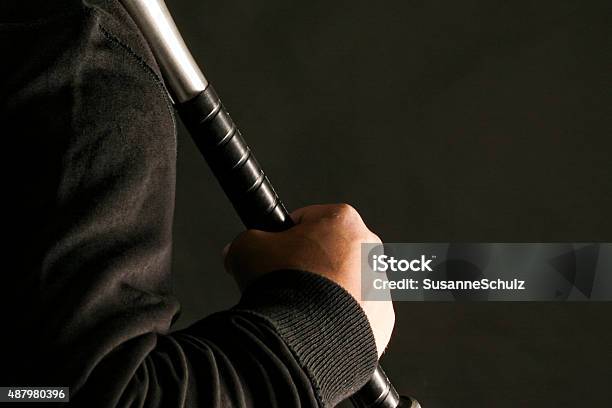 Man Holding Baseball Bat Stock Photo - Download Image Now - Metal, Baseball Bat, Crime