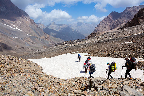 istock Group of Hikers Walking on Snowfield 487980650