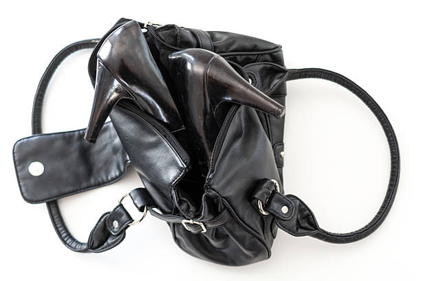istock Small female purse with heels 487980862