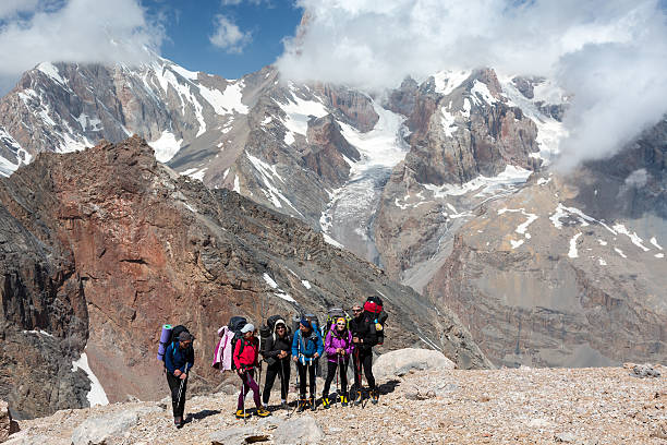 istock Backpackers Team Staying on Rocky Moraine 487981058