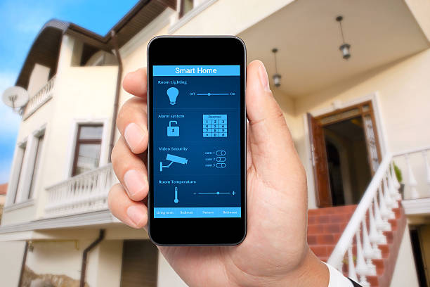 istock male hand hold phone with system smart house 487997597