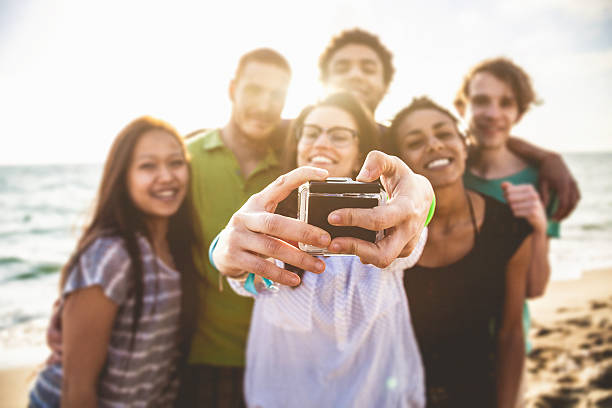 istock Friends self portrait on the beach 487998147