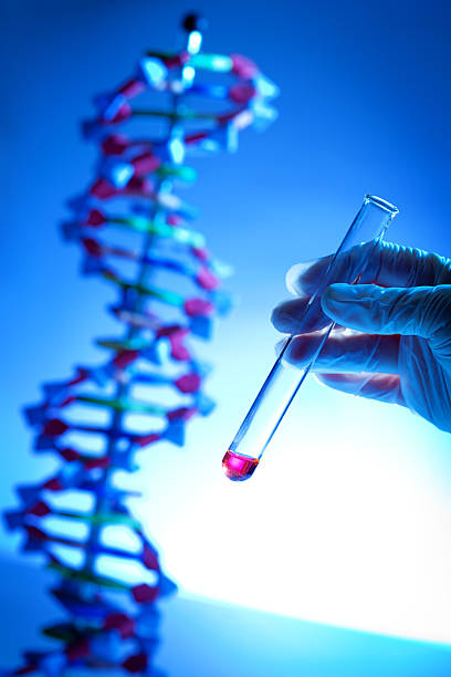 istock Genome Project with Genetic DNA Sample in Test Tube Vertical 487998431