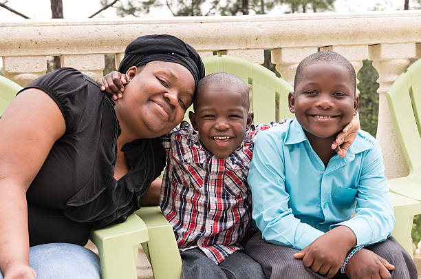 istock African American mom and two sons 487999325