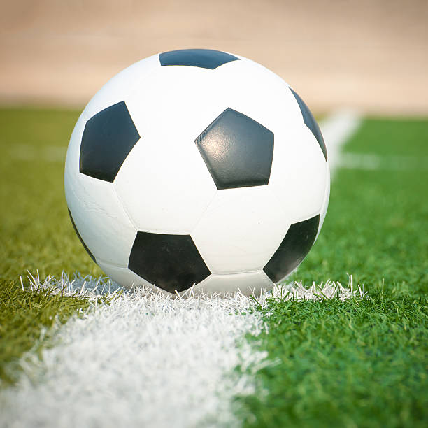 istock Soccer ball on the field 487999329