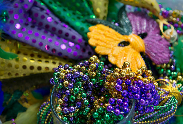 istock Mardi Gras beads and mask 487999333