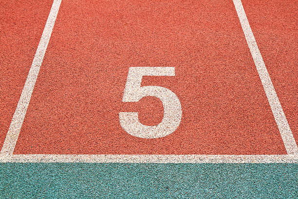 istock Number one on the start of a running track 488000747