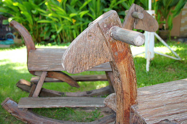 wooden horse chair for children decorated in garden