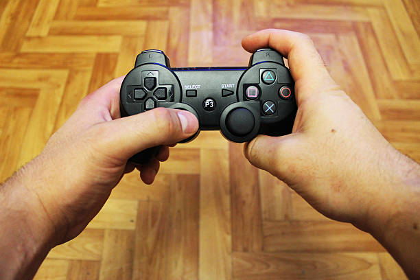 istock Joystick for video game consoles in the hands 488001770