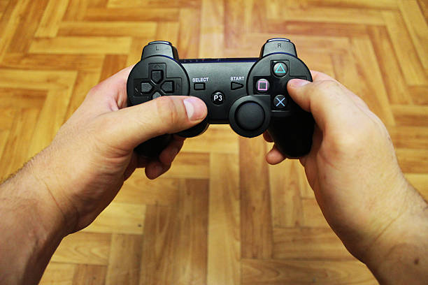 istock Joystick for video game consoles in the hands 488001820