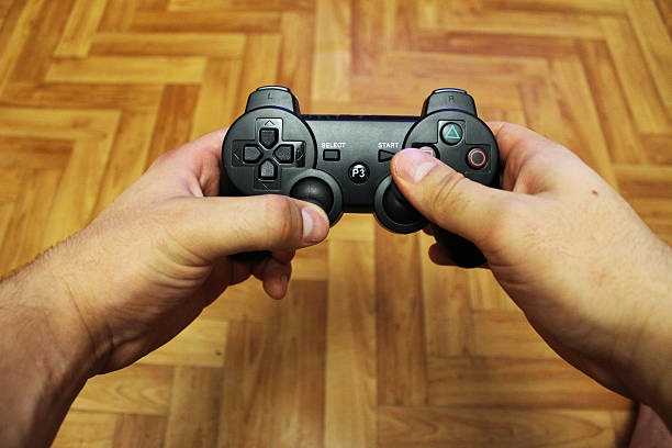 istock Joystick for video game consoles in the hands 488001922