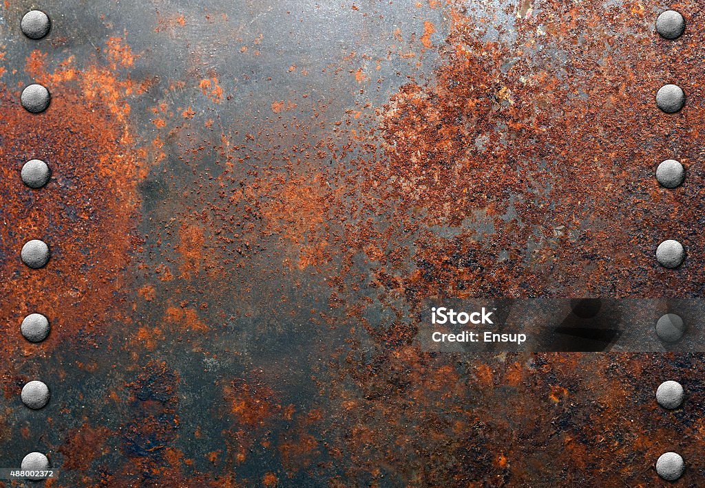Metal texture Rusty metal texture with rivets Rusty Stock Photo