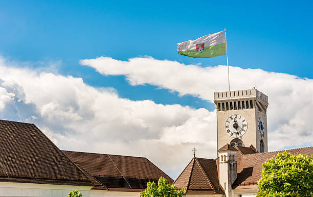 Castle clock tower with a flag stock photo