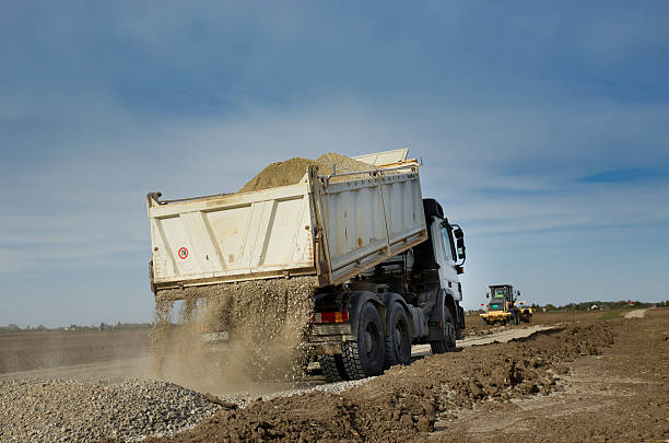 istock Truck tipping gravel 488003720