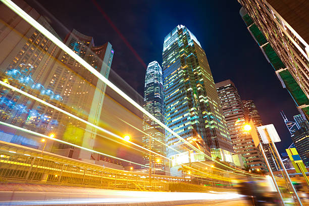 istock Road light trails on streetscape buildings in HongKong 488004293