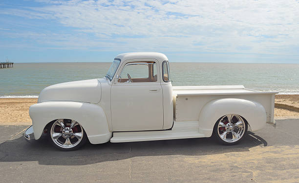 White 1952 Chevrolet pickup Felixstowe, Suffolk, England - August 29, 2015: White 1952 Chevrolet pickup on show at Felixstowe seafront. 1952 stock pictures, royalty-free photos & images