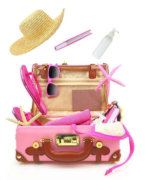 istock Ready to travel open pink suitcase with summer equipment 488004809