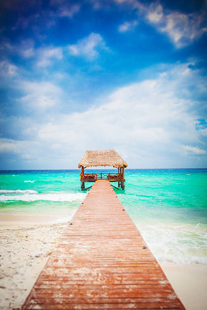 Tropical Beach with jetty. Mexico. Riviera Maya. stock photo