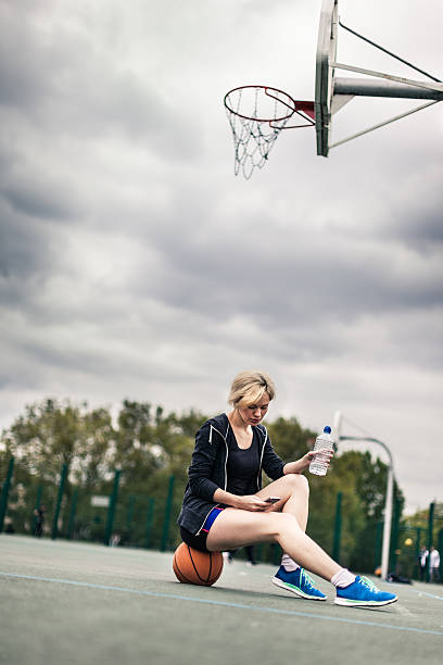 istock Relaxing after basketball match at playground 488005320