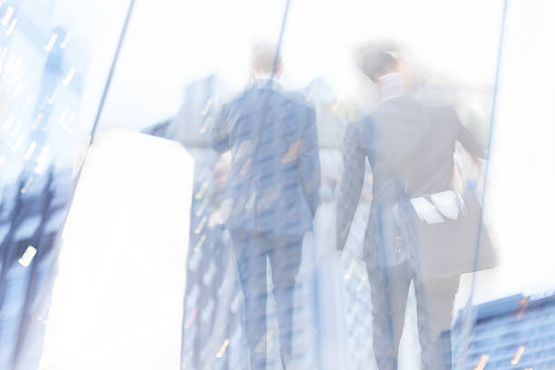 istock motion blur business people 488006282