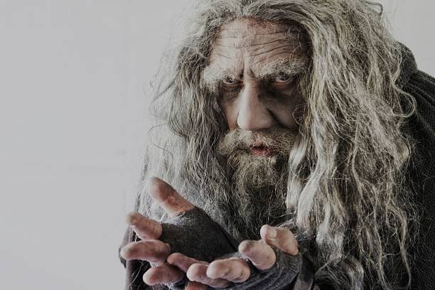 istock unkempt mature man with hands outstretched 488011388