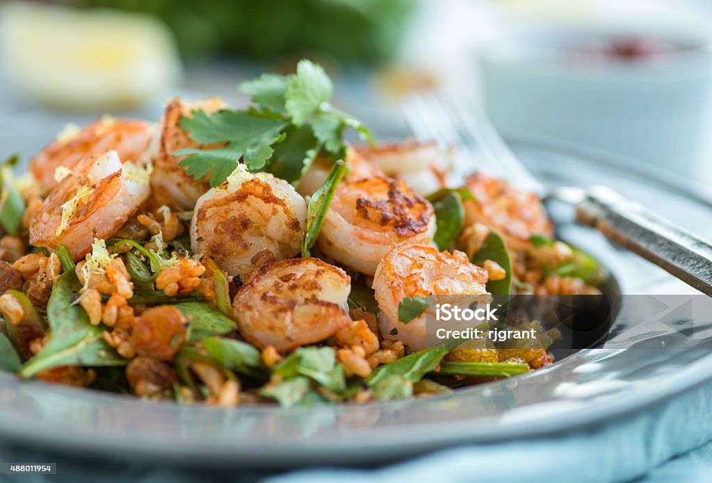 Shrimp Salad Spice shrimp and rice salad with spinach 2015 Stock Photo