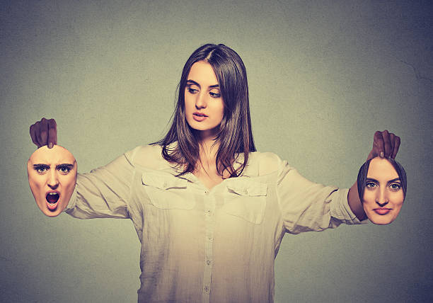 istock beautiful girl holds two masks 488015600