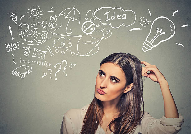 istock puzzled woman thinking scratching head has ideas looking up 488016472