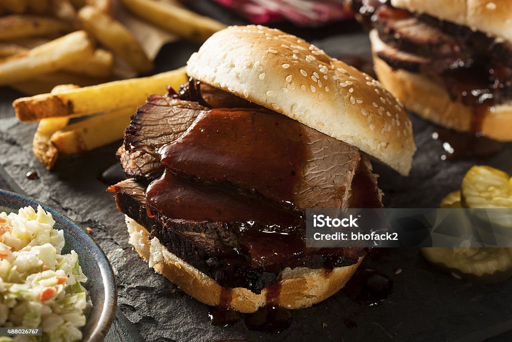 Smoked Barbecue Brisket Sandwich Smoked Barbecue Brisket Sandwich with Coleslaw and Bake Beans Brisket Stock Photo